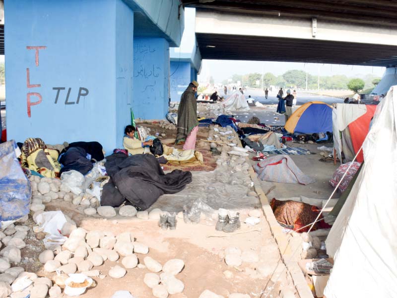 protesters rest ready to pelt stones at police photo mudassar raja express