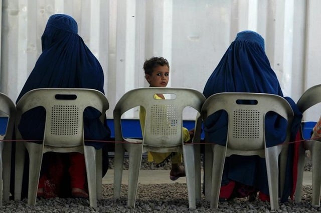 file photo afghan refugees are seen at unhcr s voluntary repatriation centre in peshawar pakistan june 23 2016 photo reuters