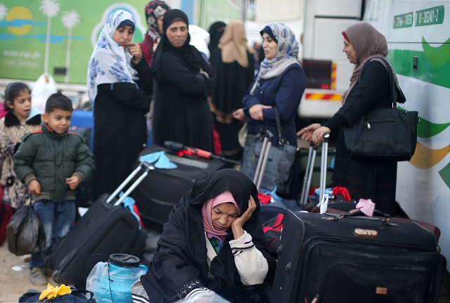 palestinians wait for travel permits to cross into egypt for the first time after hamas ceded rafah border crossing to the palestinian authority in khan younis in the southern gaza strip november 18 2017 photo reuters