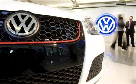 a volkswagen logo sign is seen next to the grill of a 2009 gti automobile photo reuters