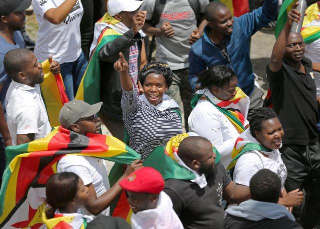 protesters march calling for zimbabwean president robert mugabe to step down in cape town south africa november 18 2017 photo reuters protesters march calling for zimbabwean president robert mugabe to step down in cape town south africa november 18 2017 photo reuters