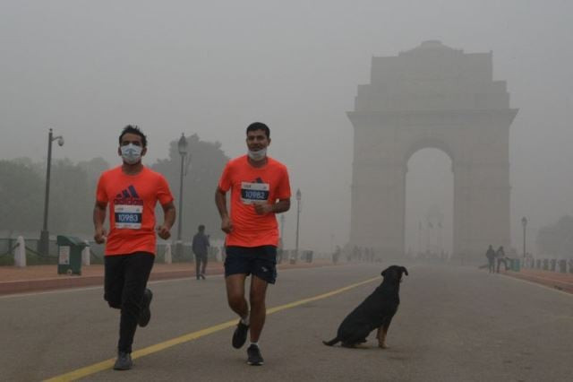 around 35 000 people registered for the race in the indian city after more than a week of hazardous pollution levels photo afp around 35 000 people registered for the race in the indian city after more than a week of hazardous pollution levels photo afp