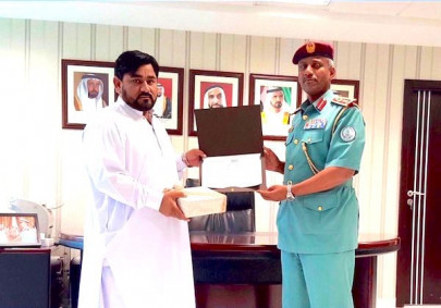 sharjah police honour pakistani for catching thief who snatched gold chain from woman