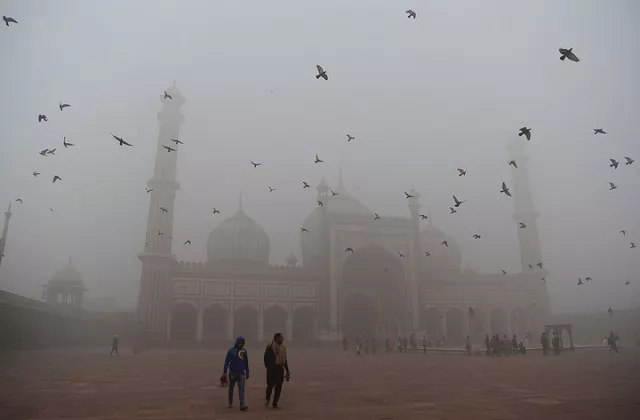 indian visitors walk through the courtyard of jama masjid amid heavy smog in the old quarters of new delhi photo afp indian visitors walk through the courtyard of jama masjid amid heavy smog in the old quarters of new delhi photo afp