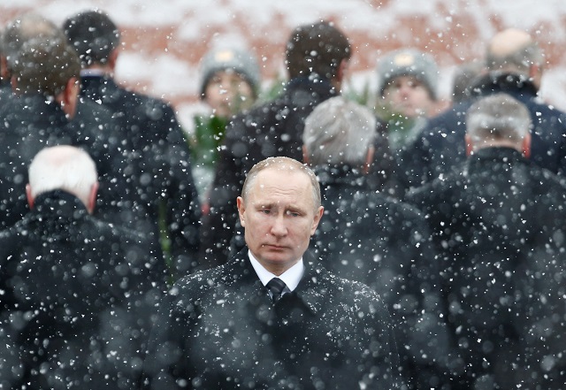 file photo russian president vladimir putin attends a wreath laying ceremony to mark the defender of the fatherland day at the tomb of the unknown soldier by the kremlin wall in central moscow russia february 23 2017 photo reuters