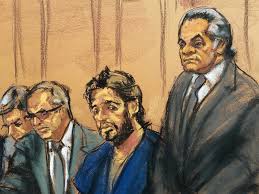 turkish gold trader reza zarrab sits with lawyers erich ferrari marc agnifilo and benjamin brafman as he appears in manhattan federal court in new york photo reuters