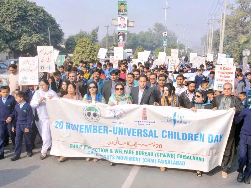 participants holding banners and placards during the walk photo online participants holding banners and placards during the walk photo online