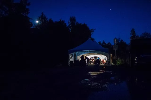 this file photo taken on august 05 2017 shows refugees who crossed the canada us border illegally near hemmingford quebec as they are processed in a tent after being arrested by the rcmp photo afp this file photo taken on august 05 2017 shows refugees who crossed the canada us border illegally near hemmingford quebec as they are processed in a tent after being arrested by the rcmp photo afp