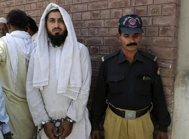 in this picture taken on may 4 2017 a handcuffed pakistani cleric who allegedly raped a child stands outside a court in kehror pakka pakistan photo ap in this picture taken on may 4 2017 a handcuffed pakistani cleric who allegedly raped a child stands outside a court in kehror pakka pakistan photo ap