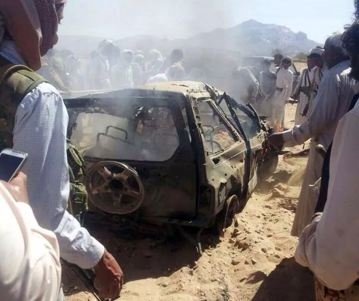 yemenis gather around a burnt car after it was targeted by a drone strike killing three suspected al qaeda militants in january last year photo afp yemenis gather around a burnt car after it was targeted by a drone strike killing three suspected al qaeda militants in january last year photo afp