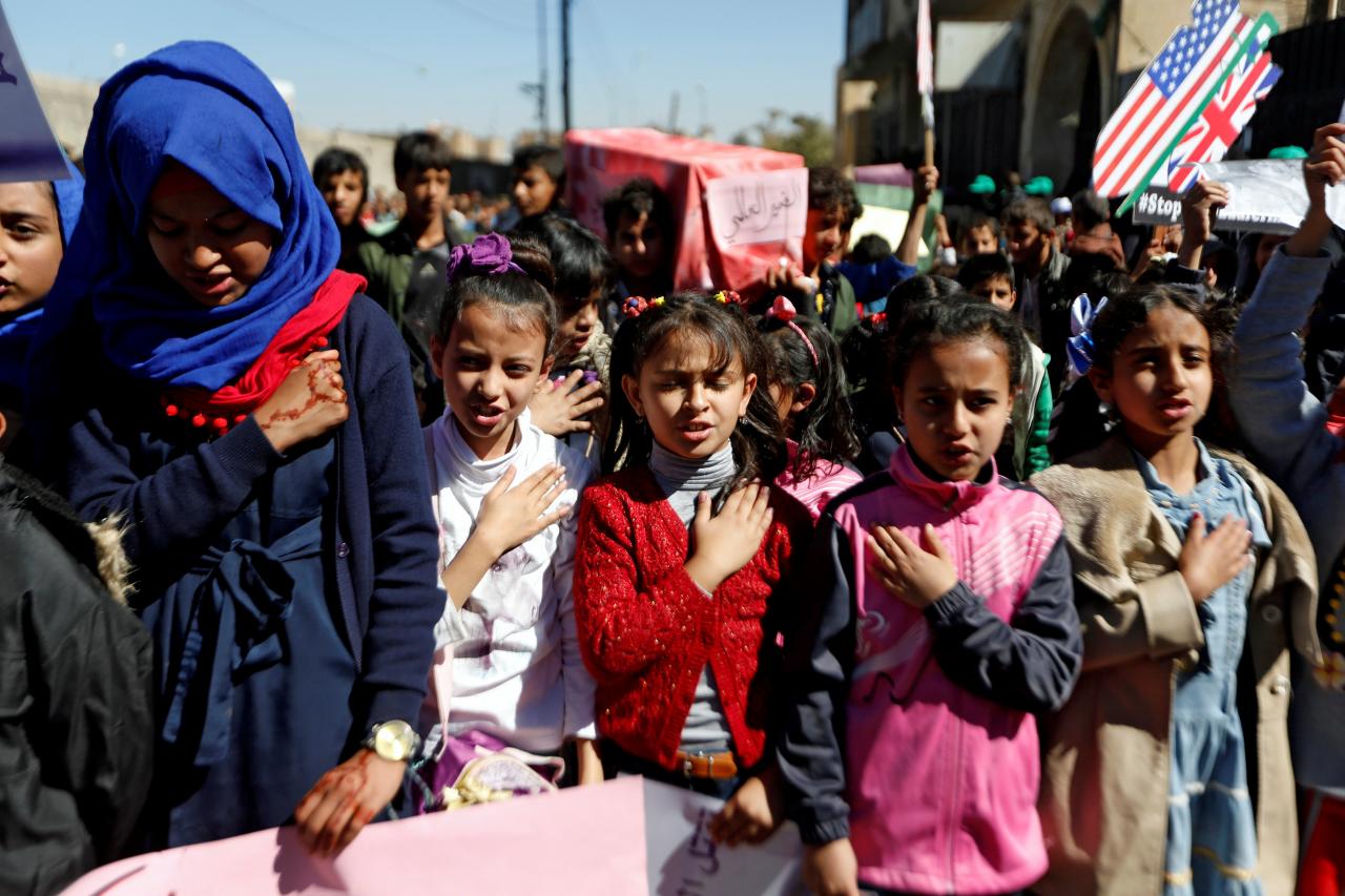 children chant the yemeni national anthem during a protest against the saudi led coalition outside the un offices in sanaa photo reuters