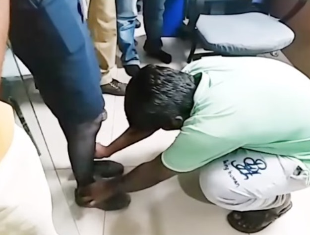 video shows indian air hostess making harasser touch her feet to apologise