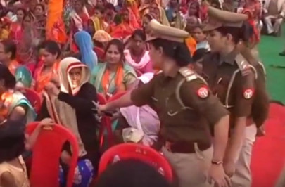 muslim woman in india forced by cops to take off burqa at up cm s rally muslim woman in india forced by cops to take off burqa at up cm s rally