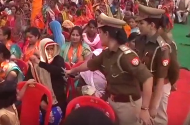 muslim woman in india forced by cops to take off burqa at up cm s rally