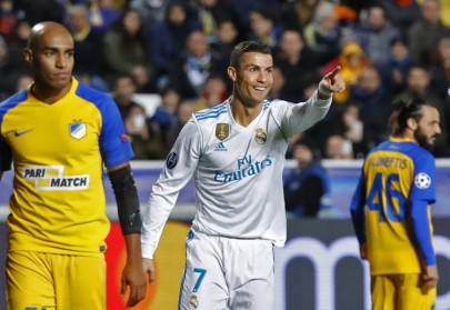 ronaldo s brace helps real cement last 16 spot ronaldo s brace helps real cement last 16 spot