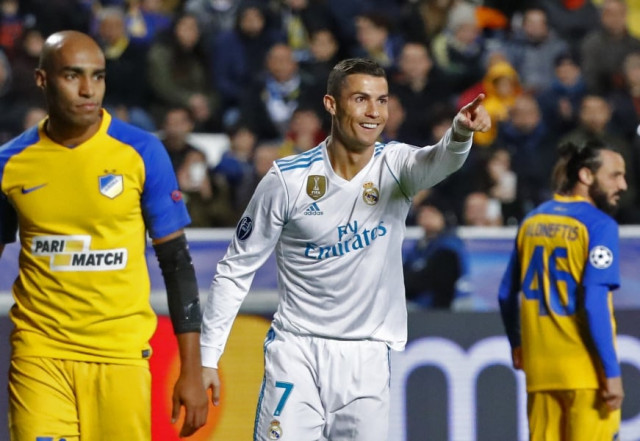 real madrid 039 s portuguese forward cristiano ronaldo c celebrates his first goal and his team 039 s fifth during the uefa champions league group h match between apoel fc and real madrid on november 21 2017 in the cypriot capital nicosia 039 s gsp stadium photo afp real madrid 039 s portuguese forward cristiano ronaldo c celebrates his first goal and his team 039 s fifth during the uefa champions league group h match between apoel fc and real madrid on november 21 2017 in the cypriot capital nicosia 039 s gsp stadium photo afp