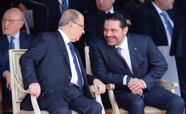saad hariri who announced his resignation as lebanon 039 s prime minister from saudi arabia reacts as he talks with lebanese president michel aoun while attending a military parade to celebrate the 74th anniversary of lebanon 039 s independence in downtown beirut lebanon photo reuters saad hariri who announced his resignation as lebanon 039 s prime minister from saudi arabia reacts as he talks with lebanese president michel aoun while attending a military parade to celebrate the 74th anniversary of lebanon 039 s independence in downtown beirut lebanon photo reuters