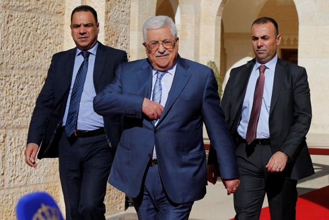 palestinian president mahmoud abbas walks to speaks to the media after his meeting with jordan 039 s king abdullah at the royal palace in amman jordan october 22 2017 photo reuters