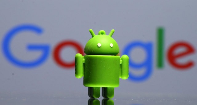 a 3d printed android mascot bugdroid is seen in front of a google logo in this illustration taken july 9 2017 photo reuters