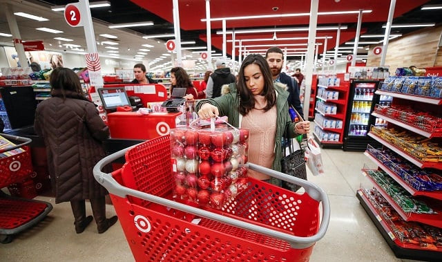 a customer loads her shopping cart during the black friday sales event on thanksgiving day at target in chicago illinois us november 23 2017 photo reuters a customer loads her shopping cart during the black friday sales event on thanksgiving day at target in chicago illinois us november 23 2017 photo reuters