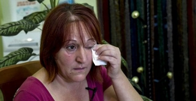 merita doci has been afraid to leave her house in fushe kruje since her husband beat her with an iron bar photo afp merita doci has been afraid to leave her house in fushe kruje since her husband beat her with an iron bar photo afp