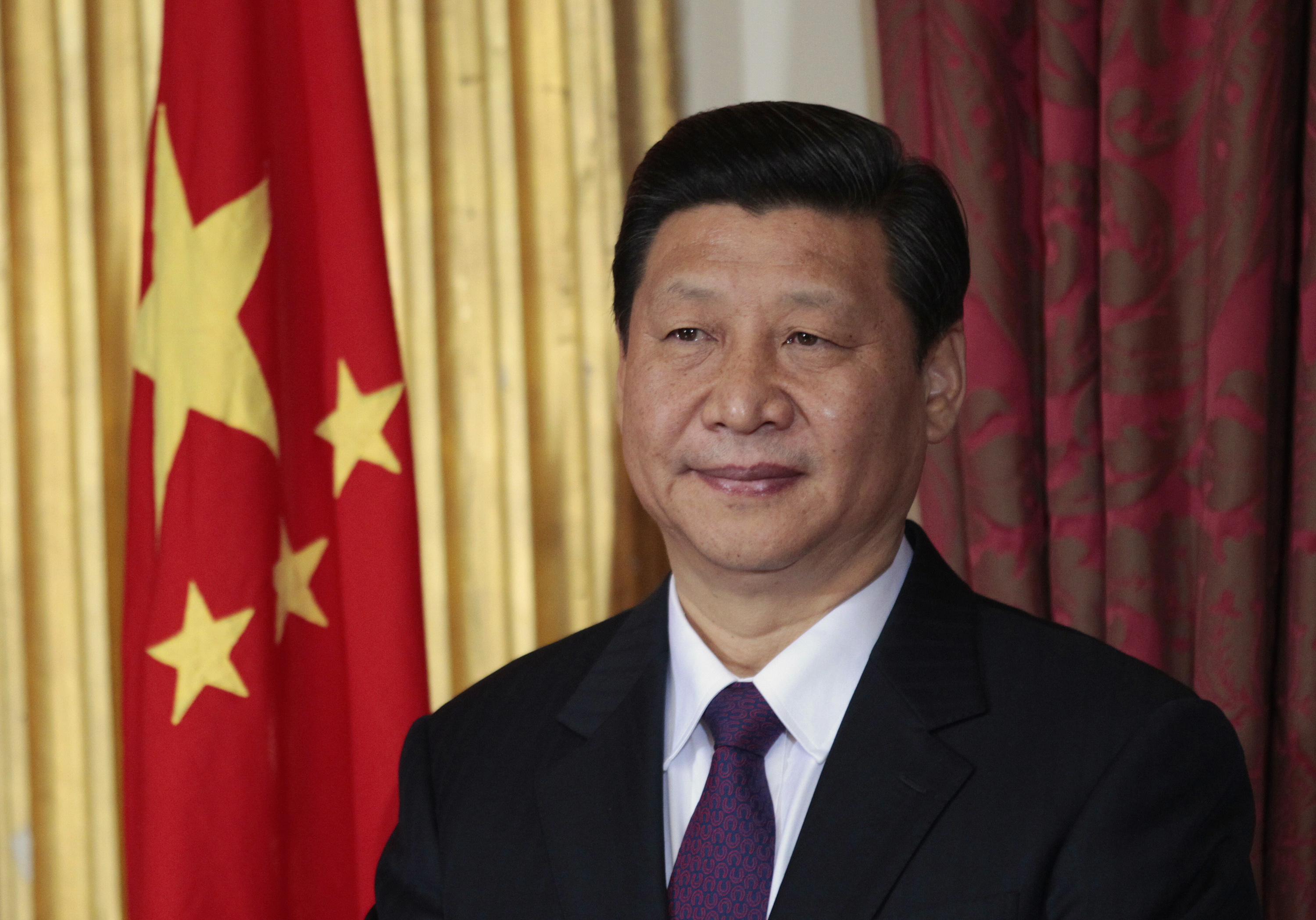 chinese president xi jinping stands during a trade agreement ceremony photo reuters