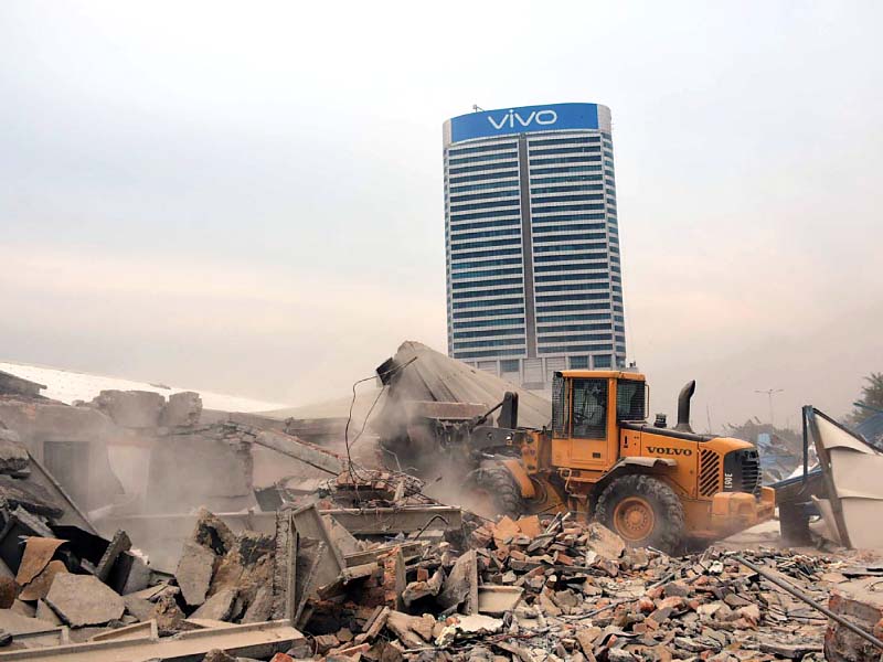 cda demolishes encroachment at centaurus mall photo inp