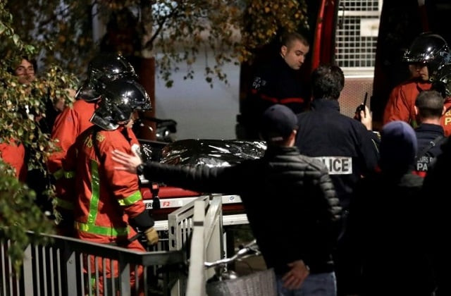 police officials and rescue personnel transport the body of the dead tiger photo afp police officials and rescue personnel transport the body of the dead tiger photo afp