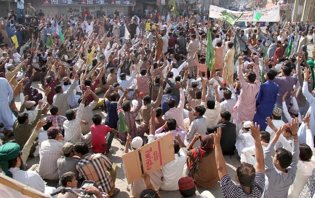 protesters in hyderabad blocked main roads and asked business owners to support their cause photo online