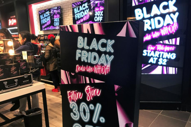 a black friday sale sign is displayed outside a makeup store photo reuters a black friday sale sign is displayed outside a makeup store photo reuters