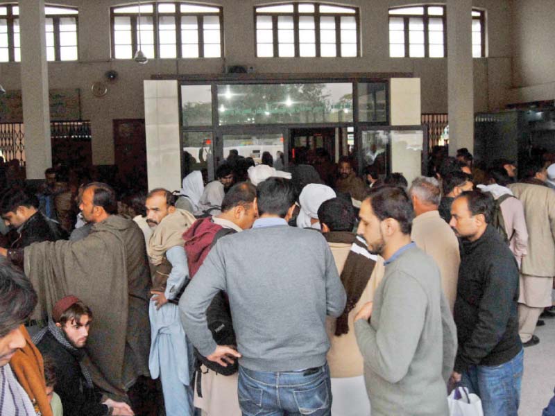 rush of people at rawalpindi railway station photo express