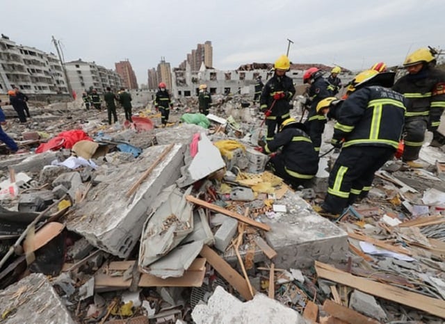 a major explosion hit china s eastern port city of ningbo sent dozens to hospitals destroyed vehicles and triggered the collapse of nearby buildings photo afp