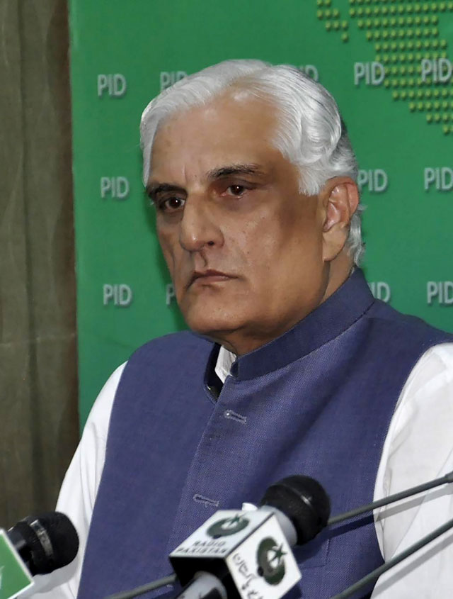 this picture taken on october 6 2017 shows former federal law minister zahid hamid looking om while addressing a news conference in islamabad photo afp