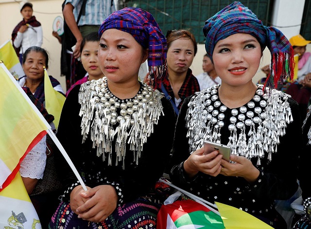women from kachin state wait outside the residence of cardinal charles maung bo archbishop of yangon where pope francis will be staying during his visit in yangon myanmar november 27 2017 photo reuters