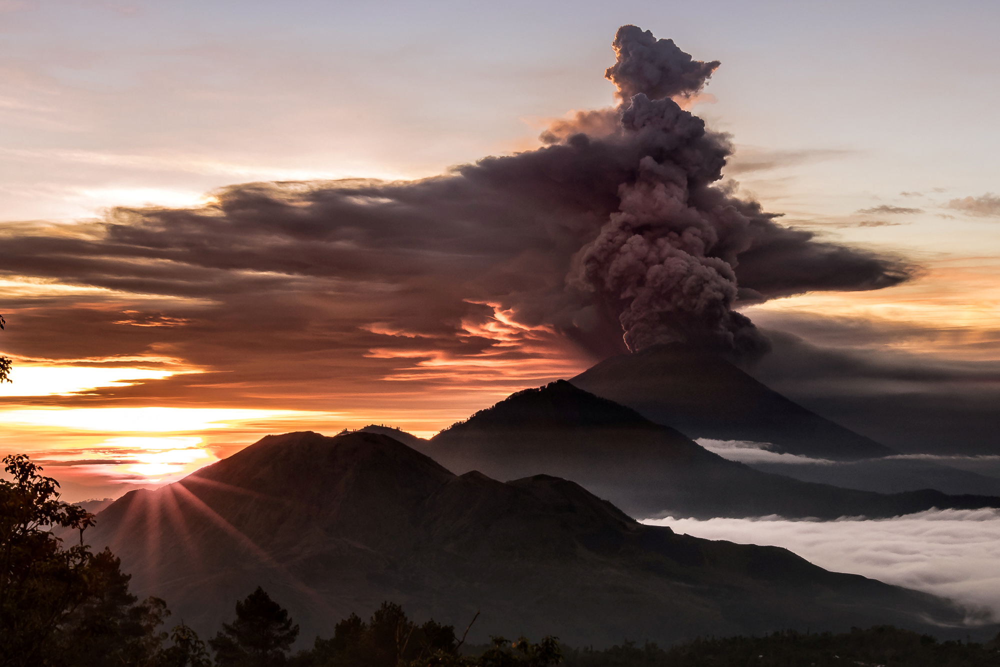 mount agung volcano is seen spewing smoke and ash in bali indonesia photo reuters