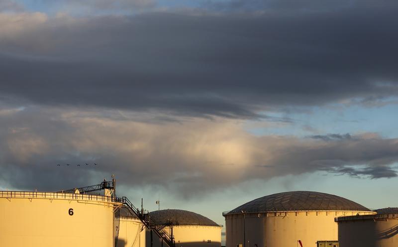 crude oil storage tanks are seen at the kinder morgan terminal in sherwood park near edmonton alberta canada photo reuters