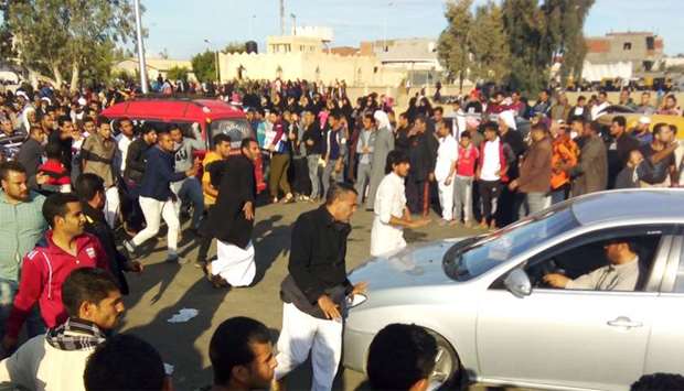 egyptians gather at the site of a gun and bombing attack that targeted the rawda mosque photo courtesy gulf times