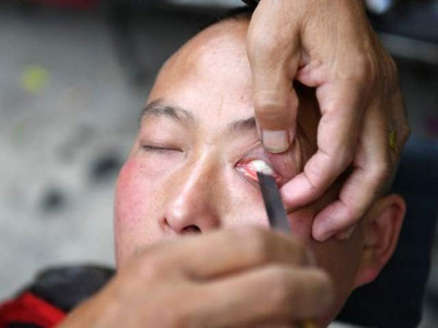 barber in china has been shaving customers eyeballs for 40 years barber in china has been shaving customers eyeballs for 40 years