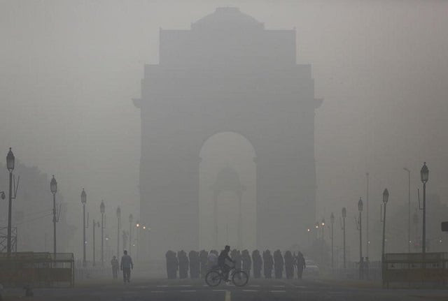 file photo a man rides his bicycle next to indian soldiers marching in front of india gate on a smoggy morning in new delhi india december 1 2015 photo reuters file photo a man rides his bicycle next to indian soldiers marching in front of india gate on a smoggy morning in new delhi india december 1 2015 photo reuters