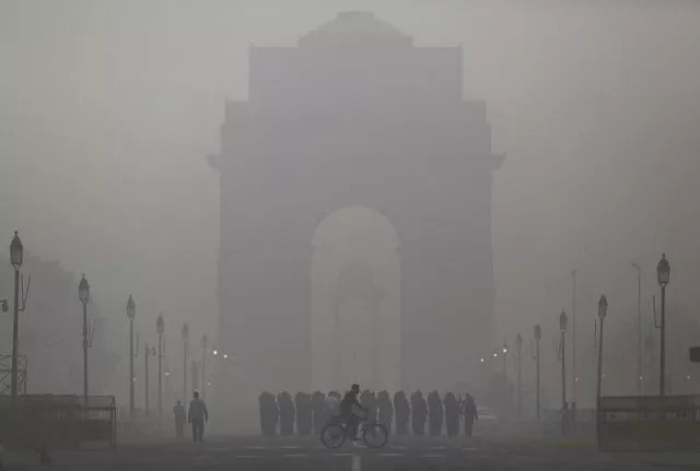 file photo a man rides his bicycle next to indian soldiers marching in front of india gate on a smoggy morning in new delhi india december 1 2015 photo reuters file photo a man rides his bicycle next to indian soldiers marching in front of india gate on a smoggy morning in new delhi india december 1 2015 photo reuters
