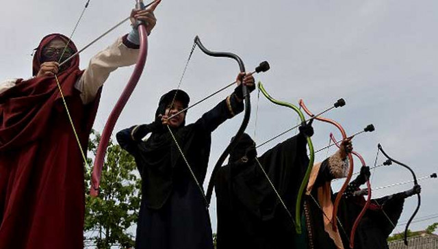 this picture shows indonesian muslim women participating in an archery lesson in bekasi photo afp this picture shows indonesian muslim women participating in an archery lesson in bekasi photo afp