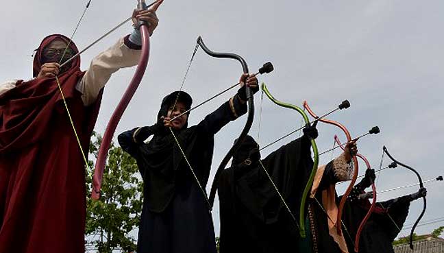 niqab squad in indonesia takes aim at society s face veil prejudice
