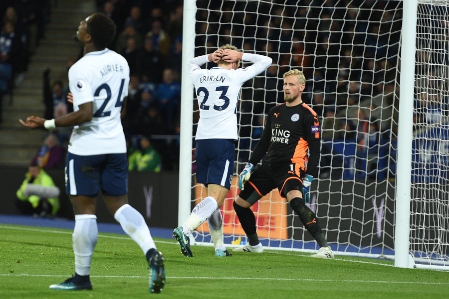 tottenham hotspur 039 s danish midfielder christian eriksen c misses a shot on goal by leicester city 039 s danish goalkeeper kasper schmeichel during the english premier league football match between leicester city and tottenham hotspur at king power stadium in leicester central england on november 28 2017 photo afp