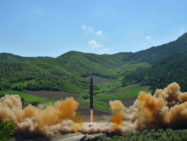 this file picture taken and released on july 4 2017 by north korea 039 s official korean central news agency kcna shows the test fire of the intercontinental ballistic missile hwasong 14 at an undisclosed location photo afp