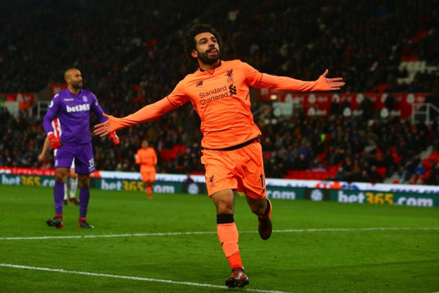 liverpool 039 s egyptian midfielder mohamed salah celebrates scoring their third goal during the english premier league football match between stoke city and liverpool at the bet365 stadium in stoke on trent central england on november 29 2017 photo afp liverpool 039 s egyptian midfielder mohamed salah celebrates scoring their third goal during the english premier league football match between stoke city and liverpool at the bet365 stadium in stoke on trent central england on november 29 2017 photo afp