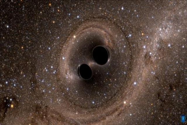 the collision of two black holes is seen in this still from a computer simulation photo reuters the collision of two black holes is seen in this still from a computer simulation photo reuters
