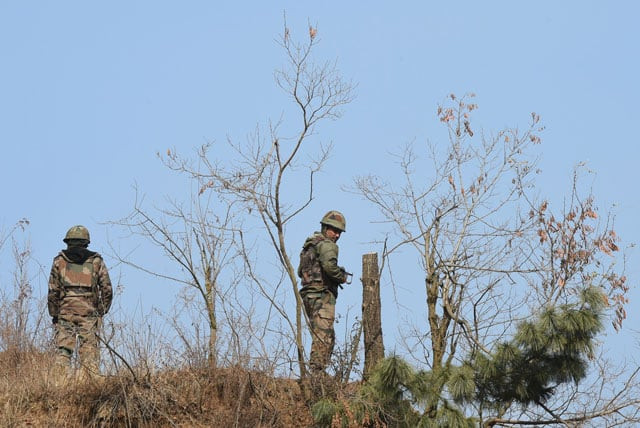 indian army personnel patrol near the site of a gunbattle between indian troops and suspects at pakharpora in the district of budgam on november 30 2017 photo afp indian army personnel patrol near the site of a gunbattle between indian troops and suspects at pakharpora in the district of budgam on november 30 2017 photo afp