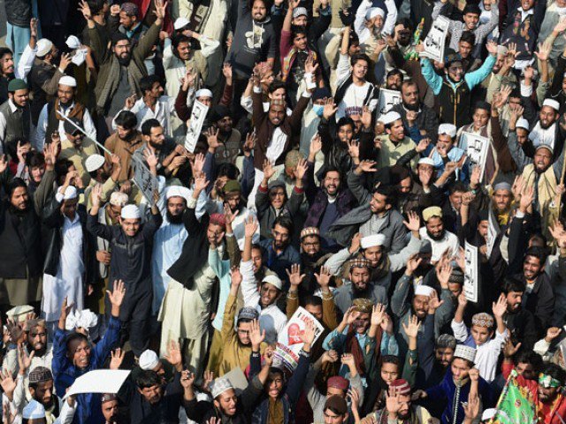 file photo protesters shout slogans against government during a protest in lahore on november 25 2017 photo afp