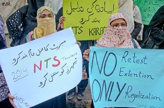 teachers protest outside the karachi press club against the nts test results annulment photo inp