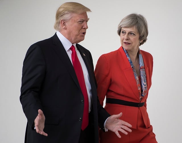 this file photo taken on january 27 2017 shows us president donald trump and british prime minister theresa may walking to a press conference at the white house in washington dc photo afp